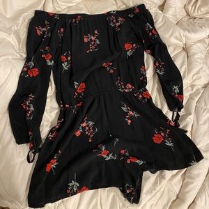 Black romper with roses all over
